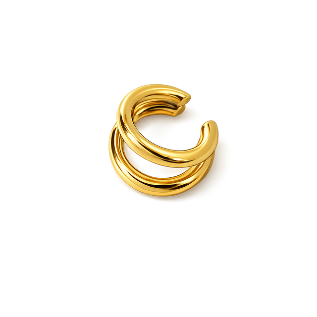 Gold ear cuff on a white background