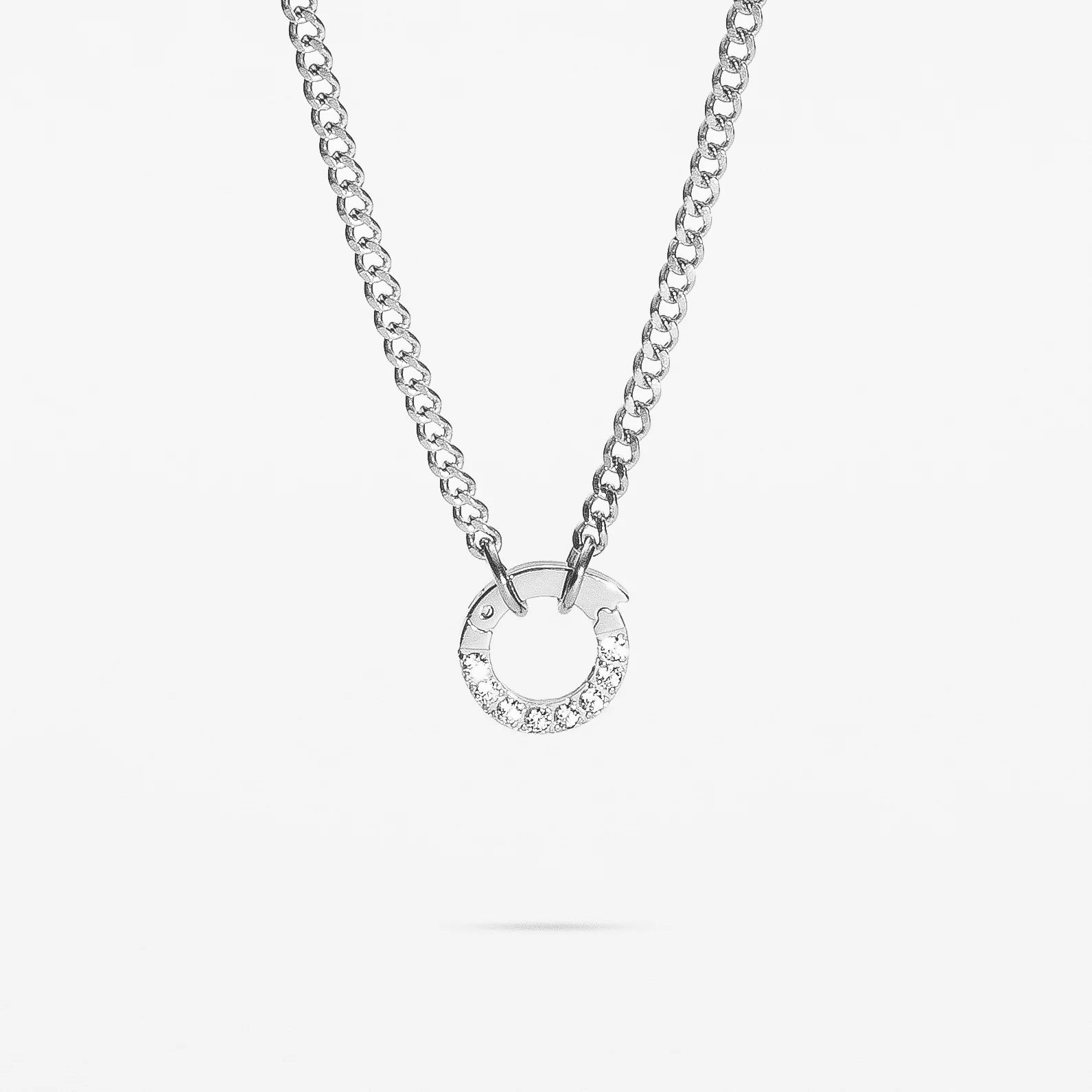 Silver necklace with a circular pendant on a white background