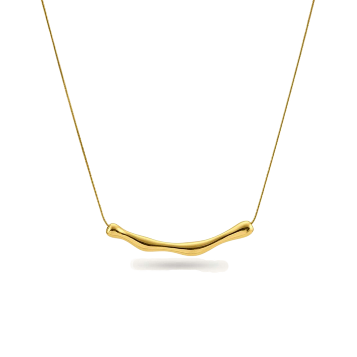 Gold necklace with a simple, curved pendant on a white background
