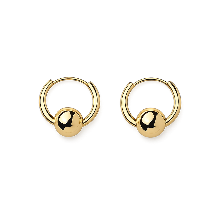 Gold hoop earrings with spherical ends on a white background