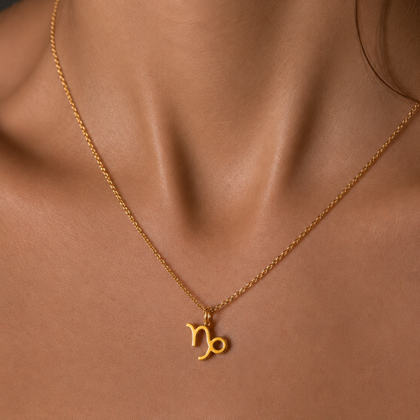 capricorn gold charm