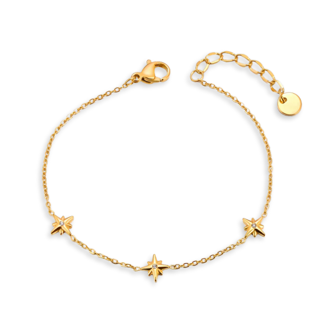 Gold bracelet with star charms on a white background