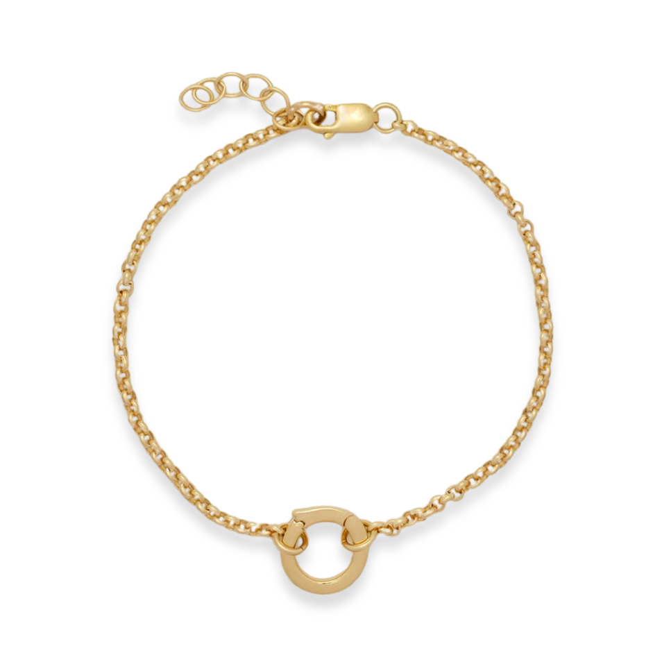 Gold bracelet on a white background
