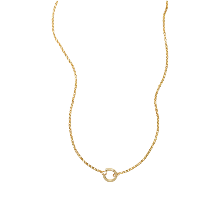 Gold necklace with a small round pendant on a white background
