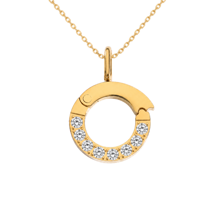 Gold necklace with a circular pendant featuring diamonds on a white background