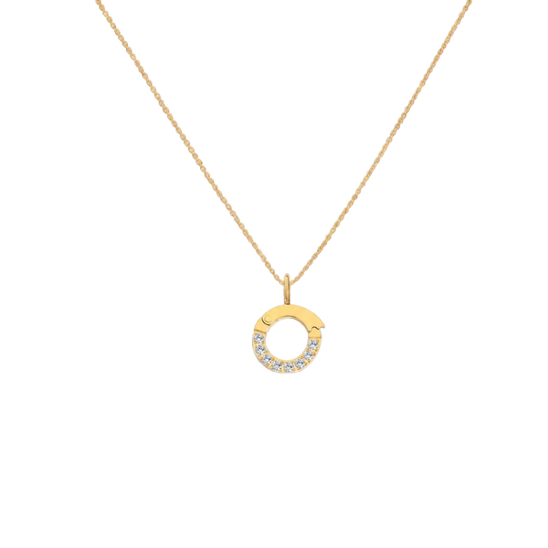 Gold necklace with a circular pendant on a white background