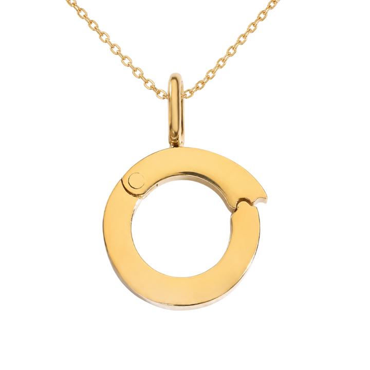Gold necklace with a unique pendant on a white background