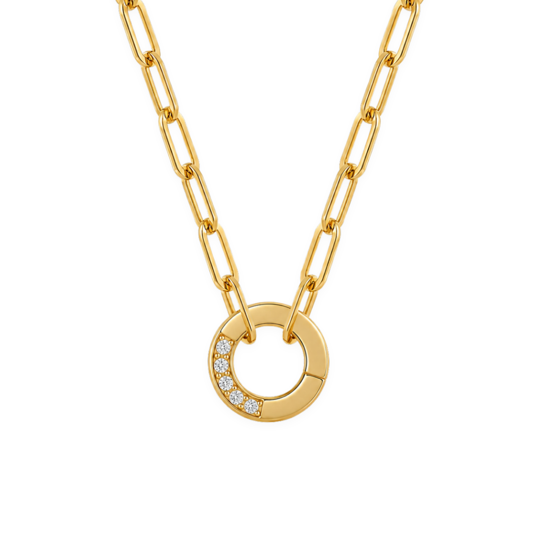 Gold necklace with a circular pendant on a white background