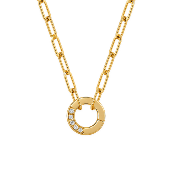 Gold necklace with a circular pendant on a white background