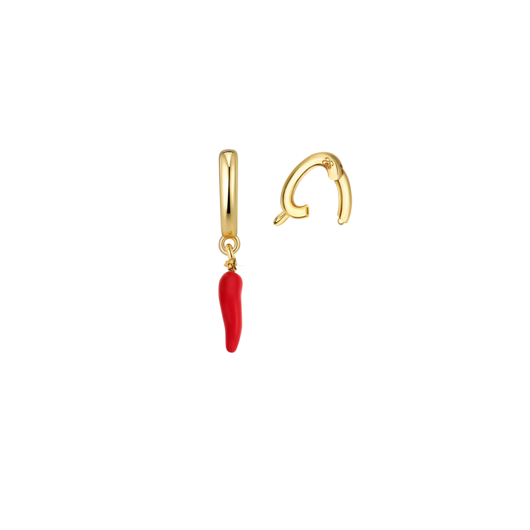 Gold earring with a red chili pepper charm on a white background