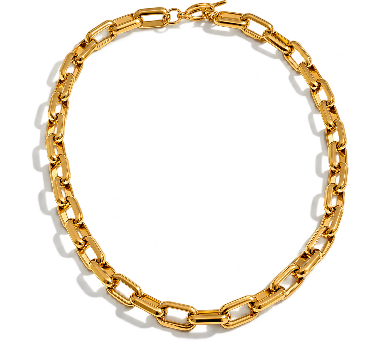 A chunky gold paperclip chain necklace arranged in a circle on a white background with soft drop shadows.