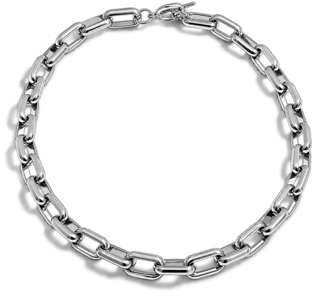 A silver-toned metal chain link necklace with a polished finish, arranged in a circle on a clean white background.