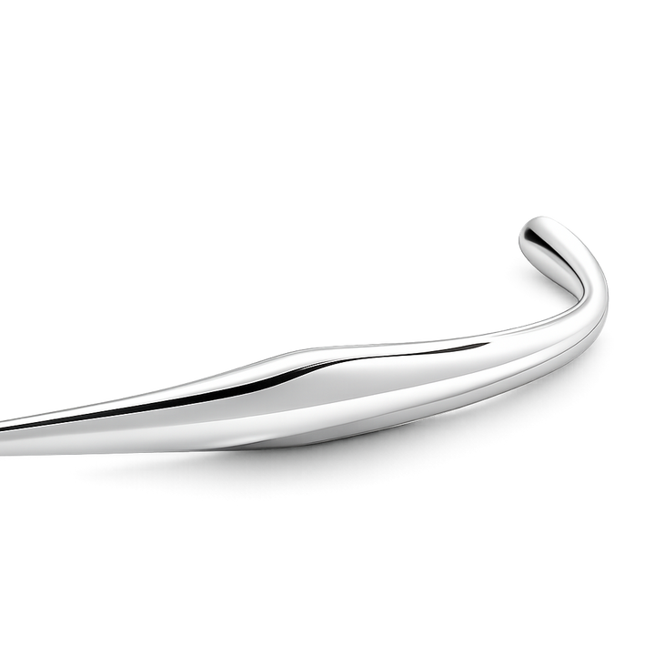 Silver bangle on a white background