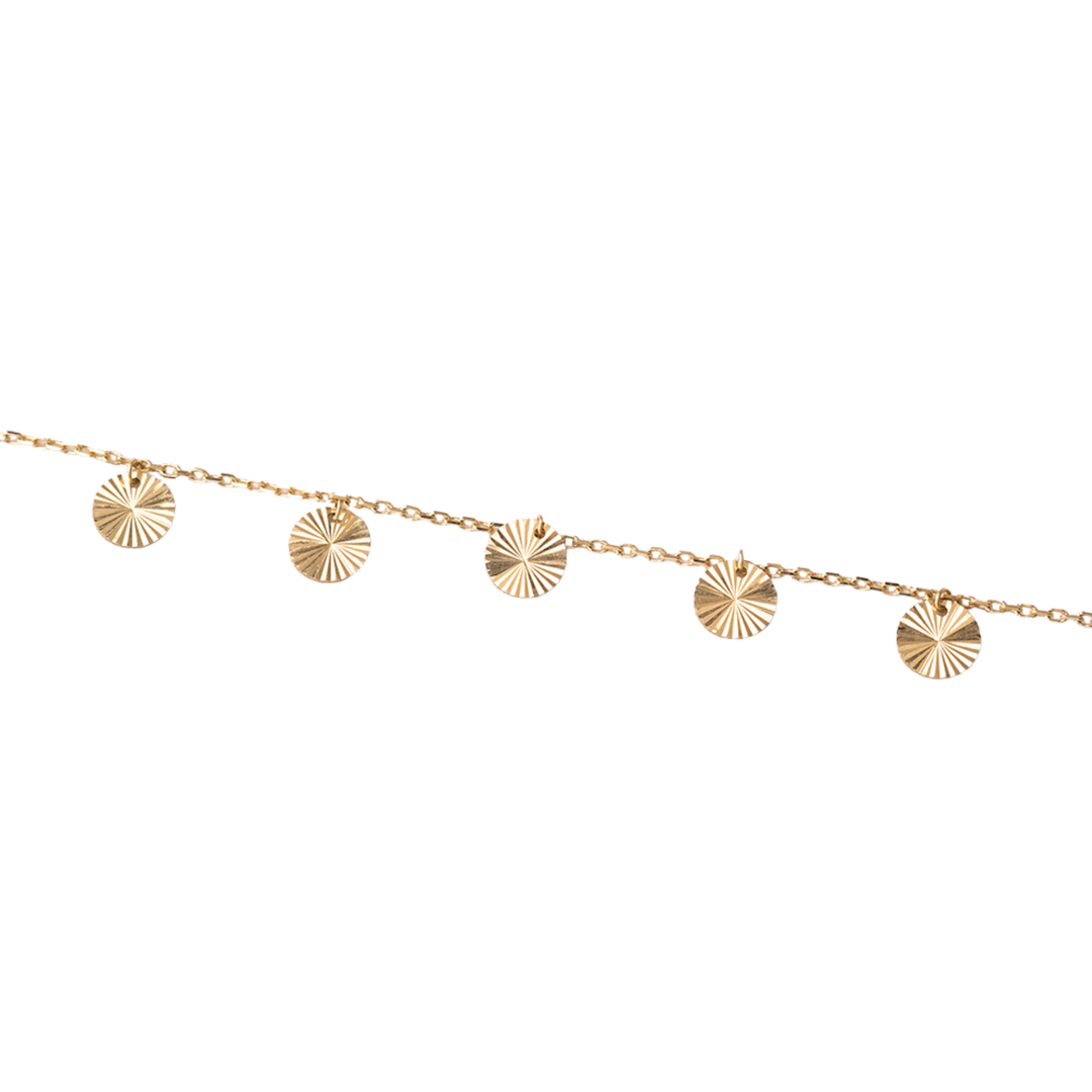 Gold necklace with circular pendants on a white background