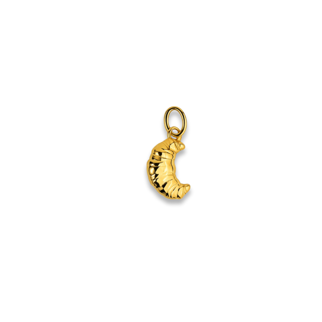 Gold moon-shaped pendant on a white background