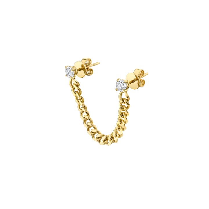 Gold chain earring with diamond-like stones on a white background
