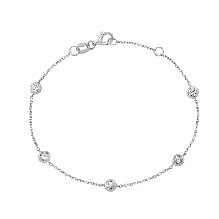 Silver bracelet with small diamonds on a white background
