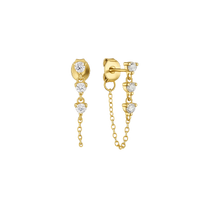 Gold earrings with diamond accents on a white background
