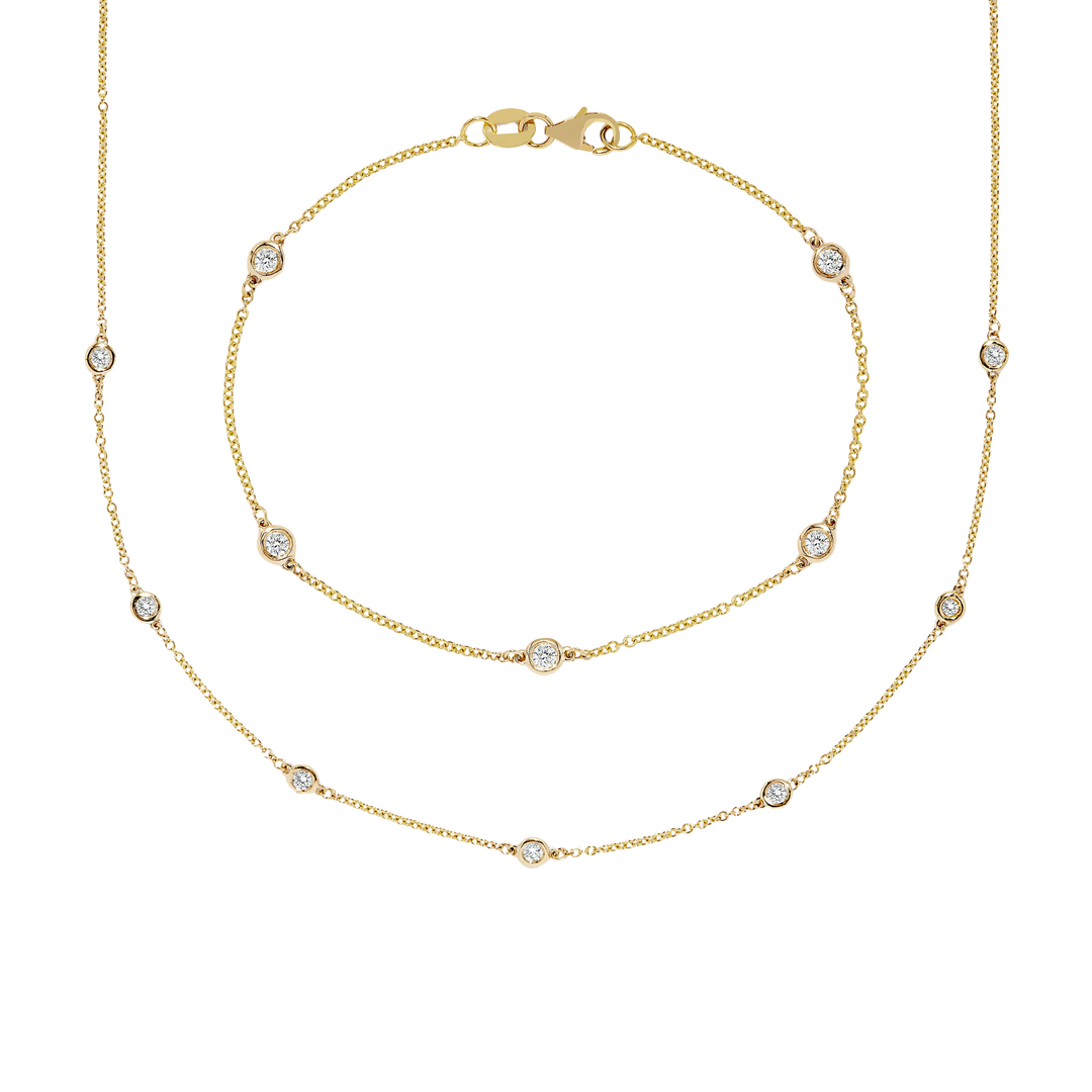 Gold necklace with small diamonds on a white background