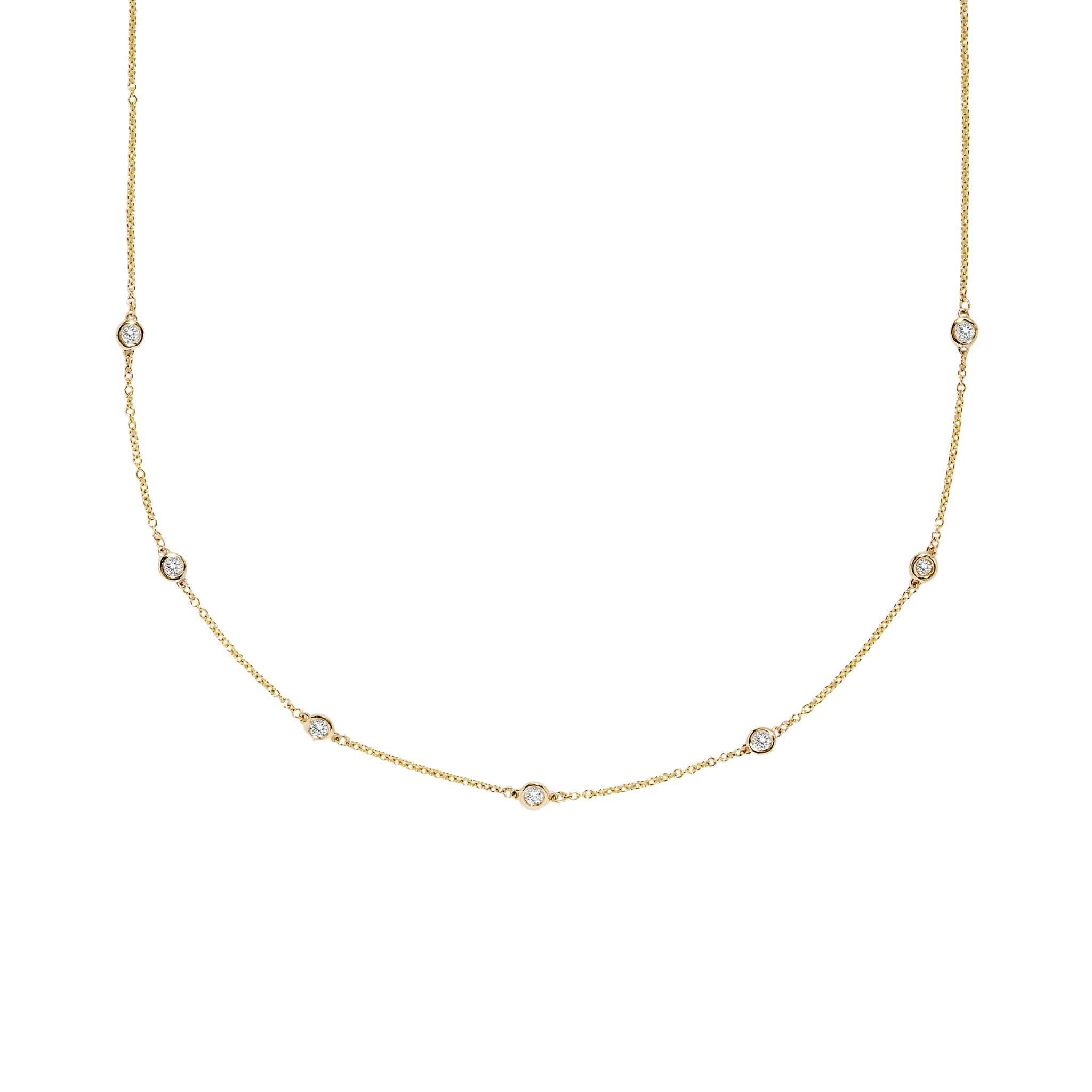 Gold necklace with small diamonds on a white background
