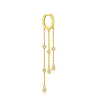 Gold hoop earring with chain and small round stones on a white background