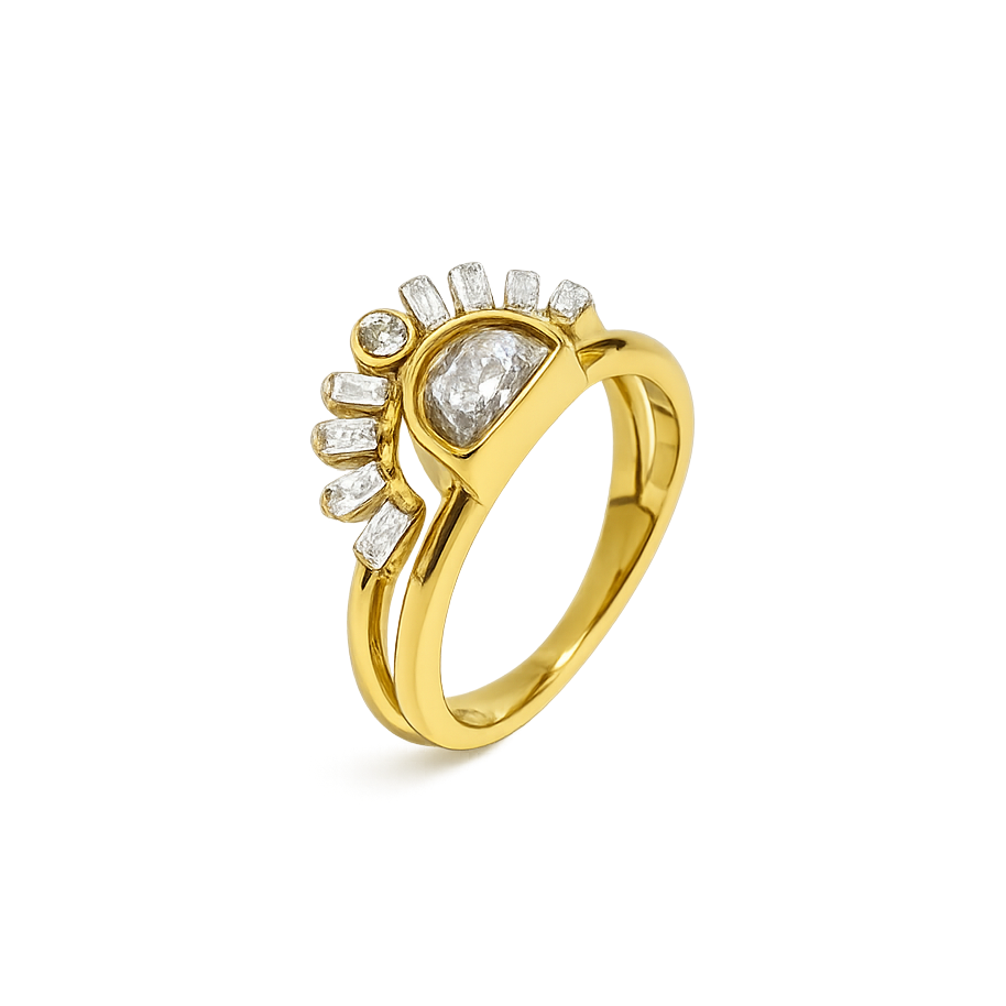 Gold ring with diamond accents on a white background