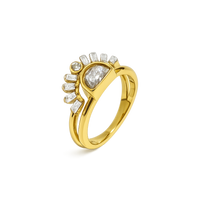 Gold ring with diamond accents on a white background