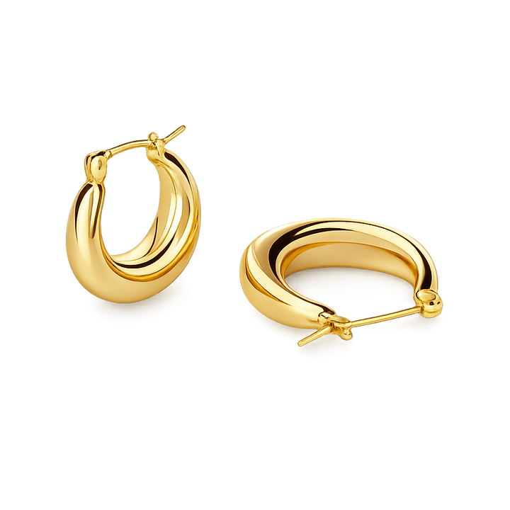 Gold hoop earrings on a white background