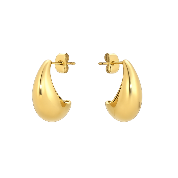 Gold hoop earrings on a white background