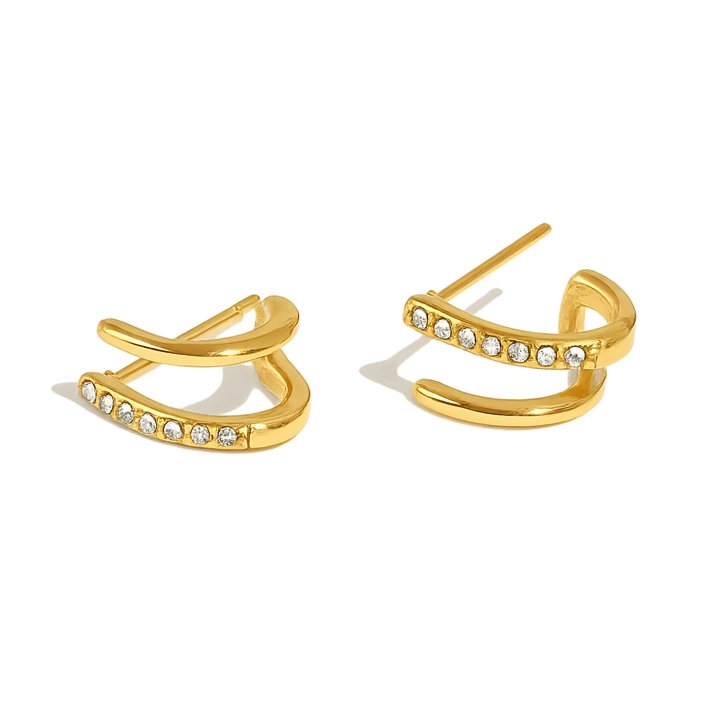 Gold hoop earrings with embedded stones on a white background