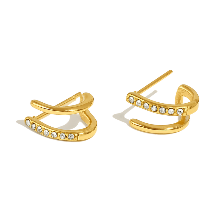 Gold hoop earrings with embedded stones on a white background