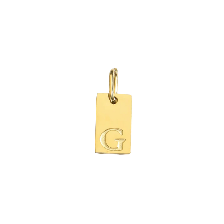Gold pendant with letter 'G' on a white background