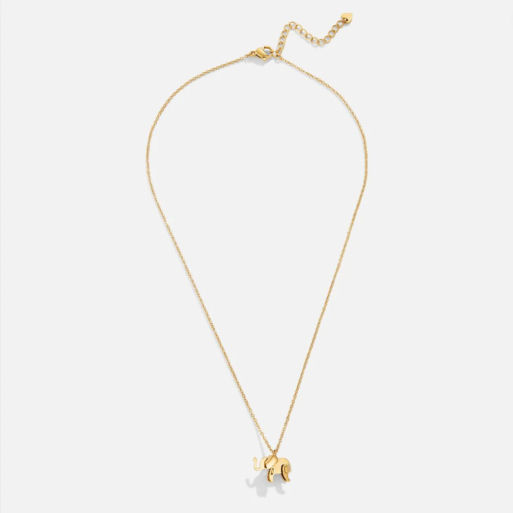 Gold necklace with a small pendant on a white background