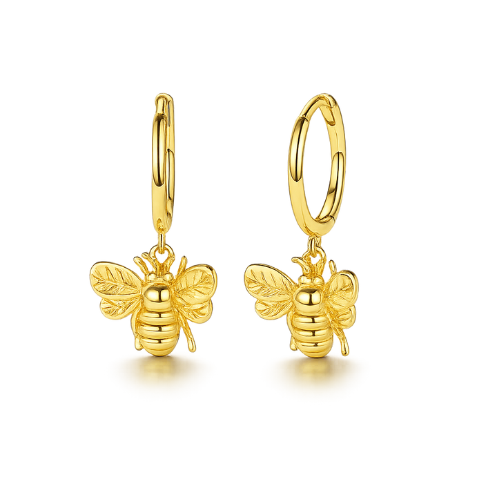 Gold bee-shaped earrings on a white background