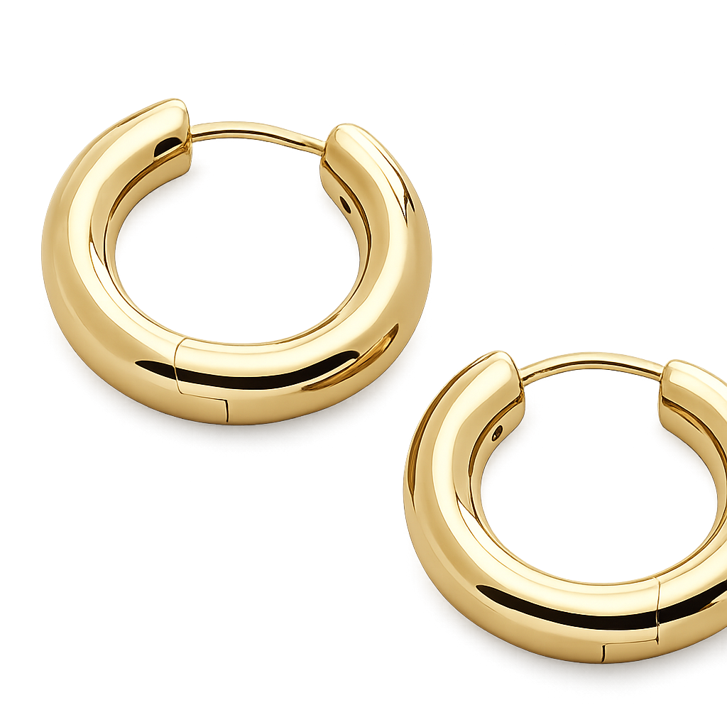 Gold hoop earrings on a white background