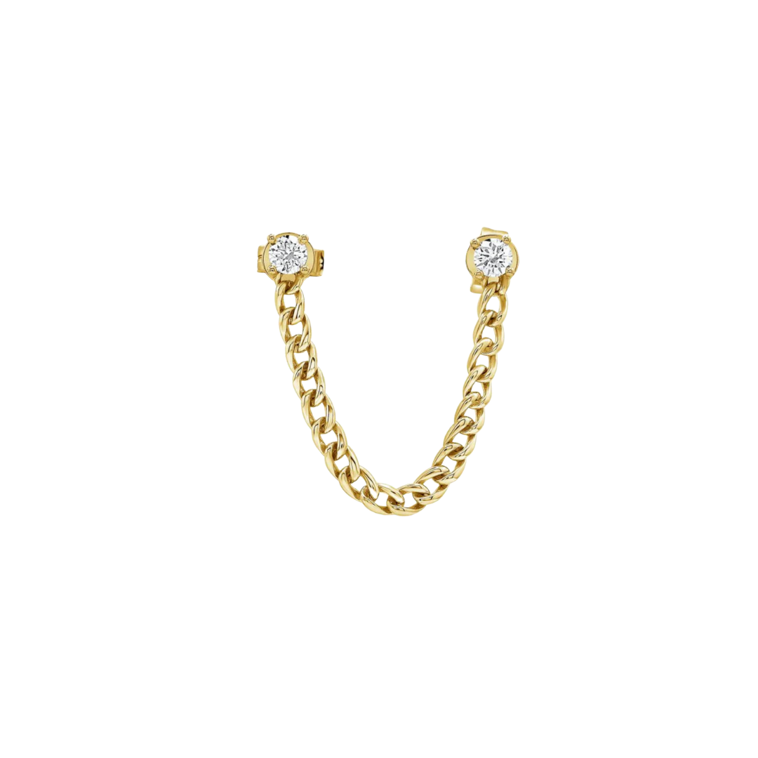 Gold chain earring with diamond-like stones on a white background