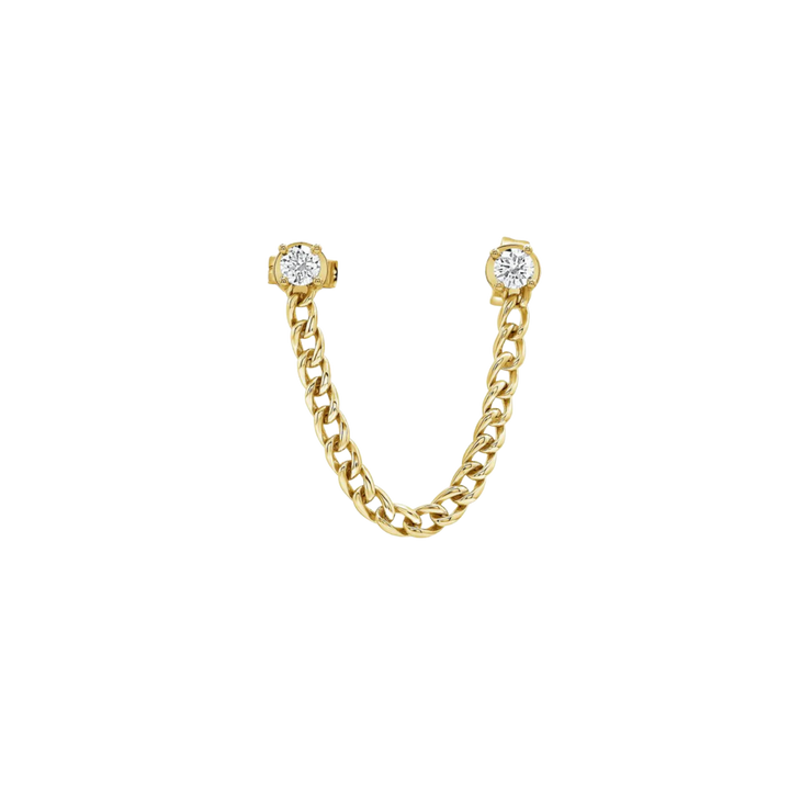 Gold chain earring with diamond-like stones on a white background