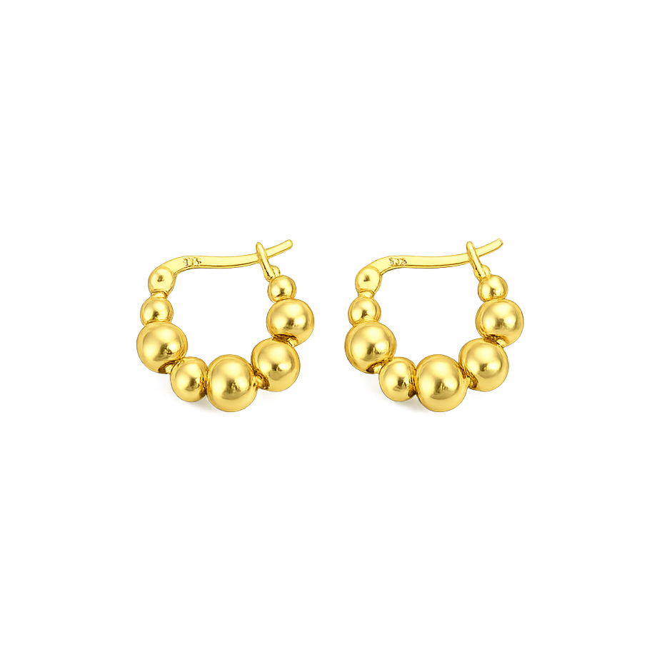 Gold hoop earrings with spherical beads on a white background