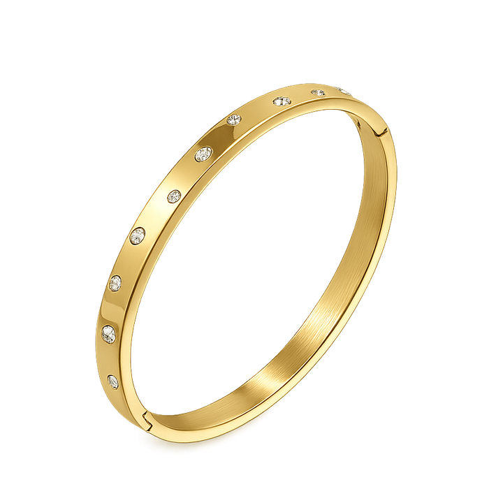 Gold bracelet with small diamonds on a white background
