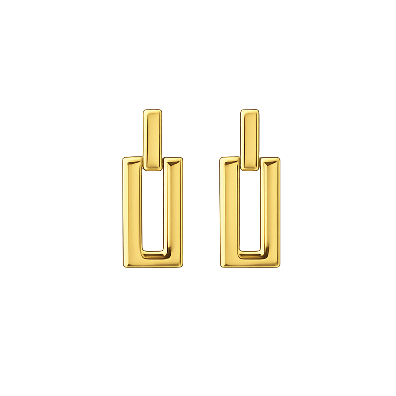 Pair of gold earrings on a white background