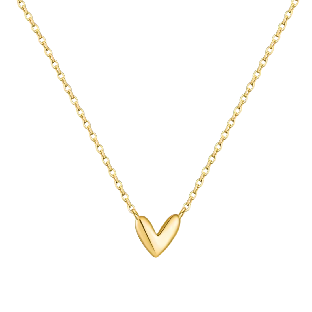 A delicate gold chain necklace featuring a polished, smooth gold heart pendant, shown against a solid white background.