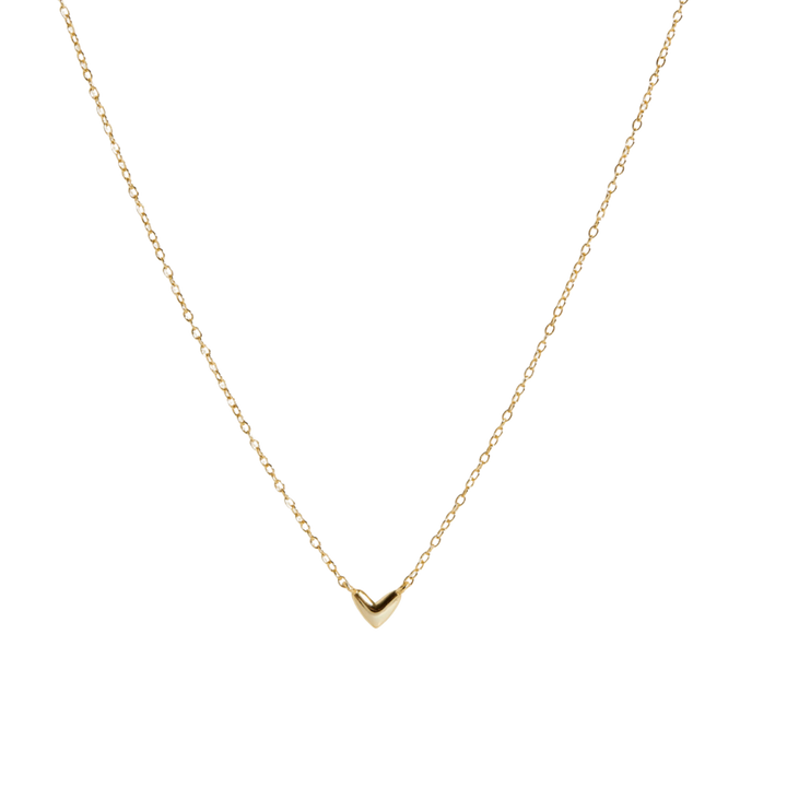 A delicate gold chain necklace featuring a small, polished gold chevron pendant, presented on a clean white background.