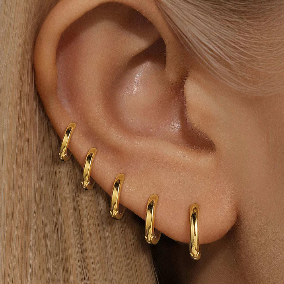 gold hinged sleeper hoops stacked