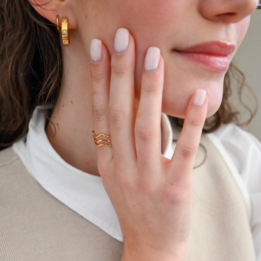 recycled gold hoops on model