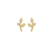 Gold leaf-shaped earrings with embedded stones on a white background