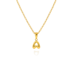 Gold necklace with a letter shaped pendant on a white background