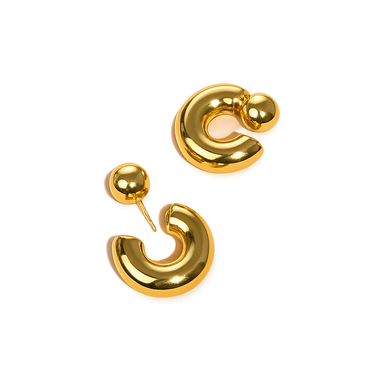Gold hoop earrings on a white background
