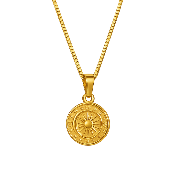 Gold necklace with a round pendant on a white background