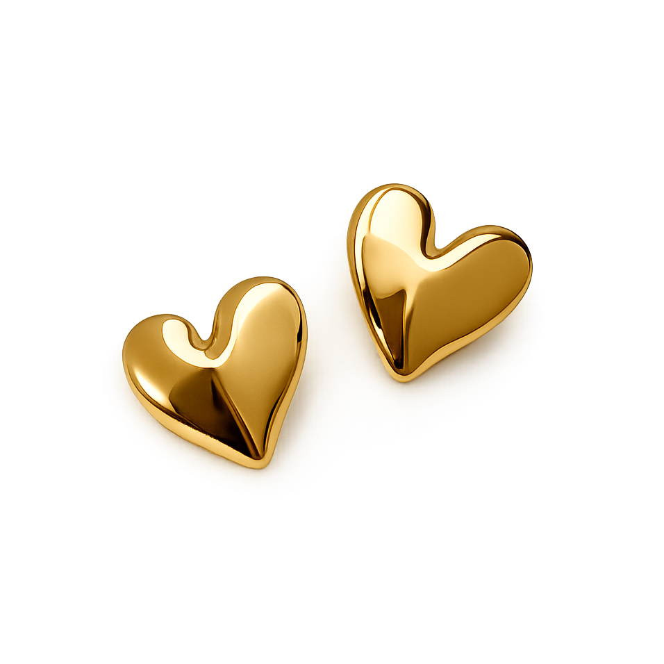 Gold heart-shaped earrings on a white background