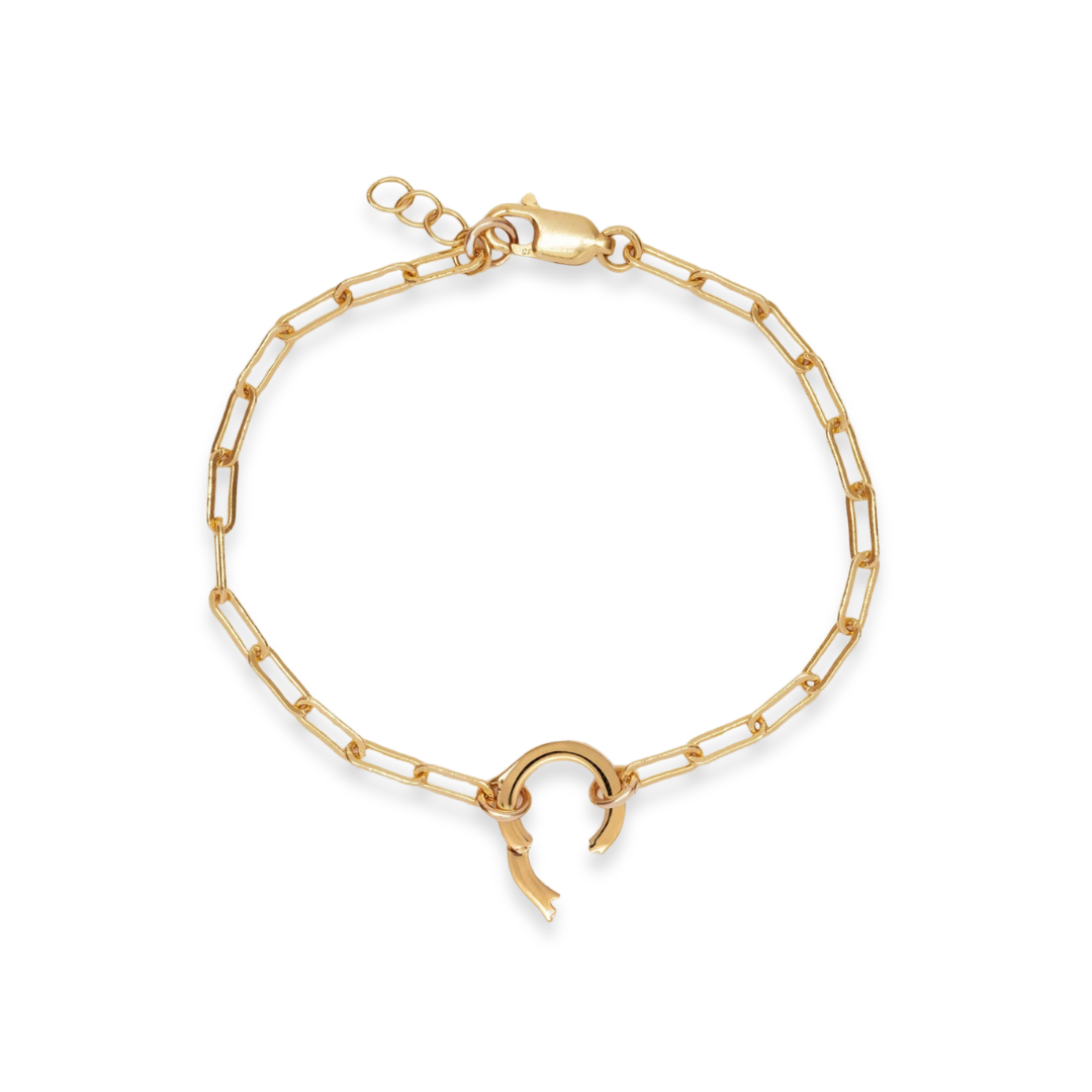 Gold chain bracelet with a unique clasp on a white background